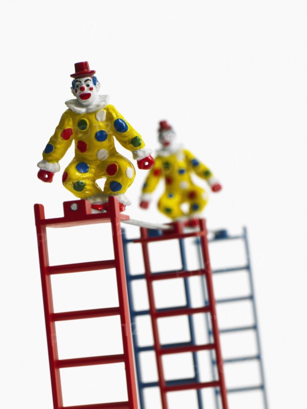 Studio shot of figurines on ladders. Photo : David Arky