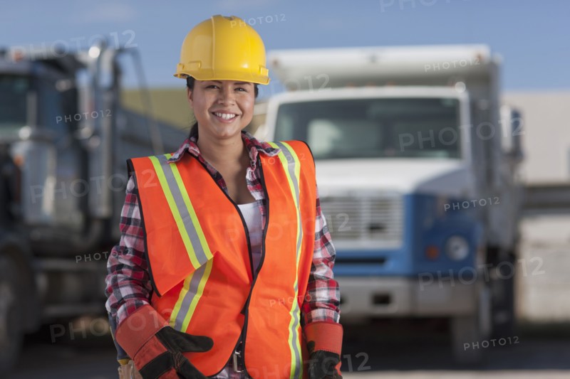 Portrait of female construction worker on building site. Photo : Dan Bannister