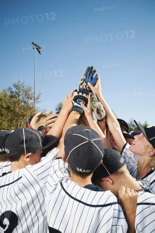 USA, California, Ladera Ranch, little league players (aged 10-11) celebrating.