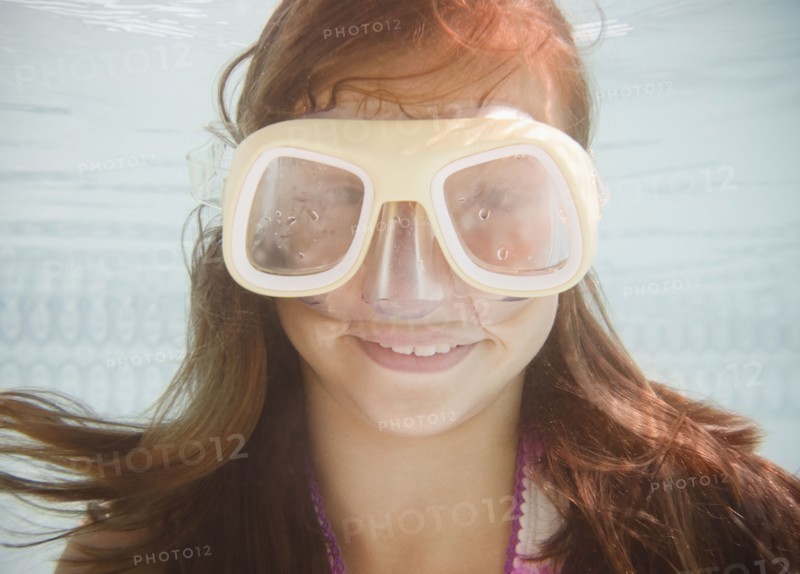 USA, New York, Girl (10-11 in swimming pool. Photo : Jamie Grill Photography