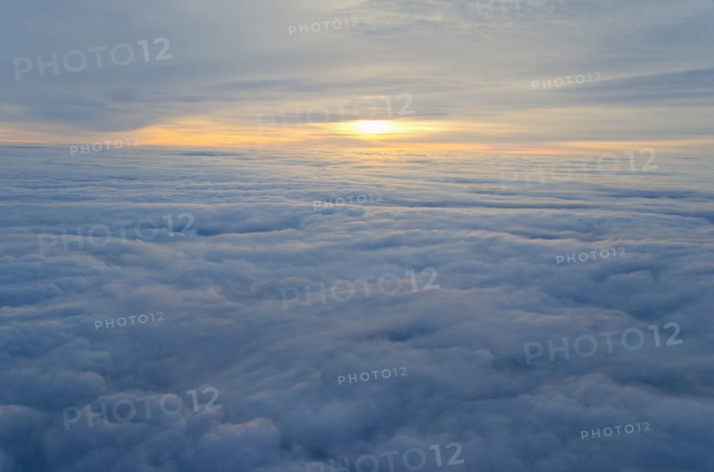 Sunrise over clouds.