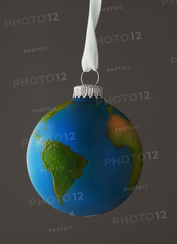 Studio Shot of Christmas ornament imitating globe. Photo : Mike Kemp