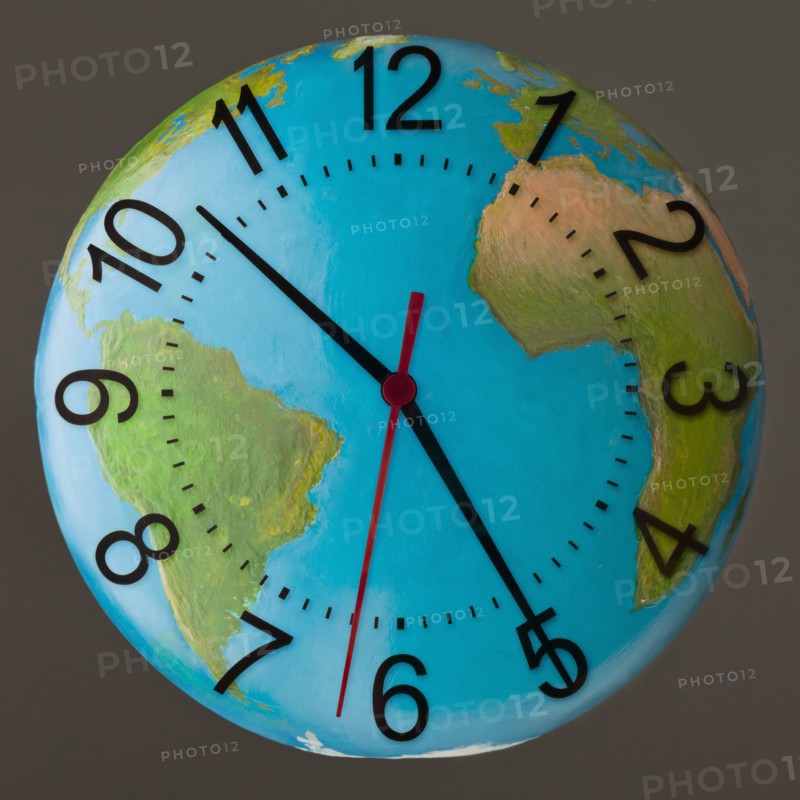 Studio Shot of clock embedded in globe. Photo : Mike Kemp