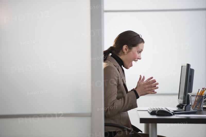 Portrait of young woman in office.