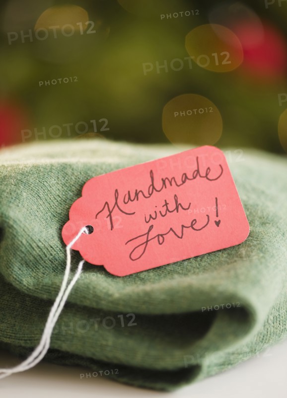 Handmade jumper with tag. Photo : Jamie Grill Photography