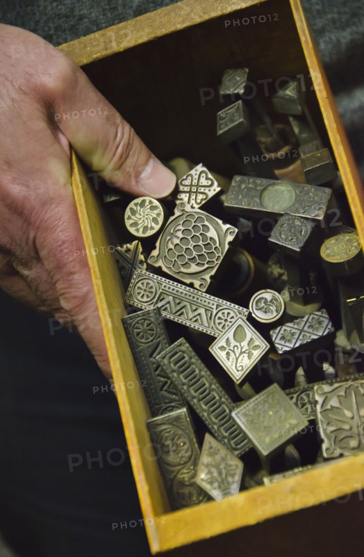 Close up of printing blocks from antique book binding.