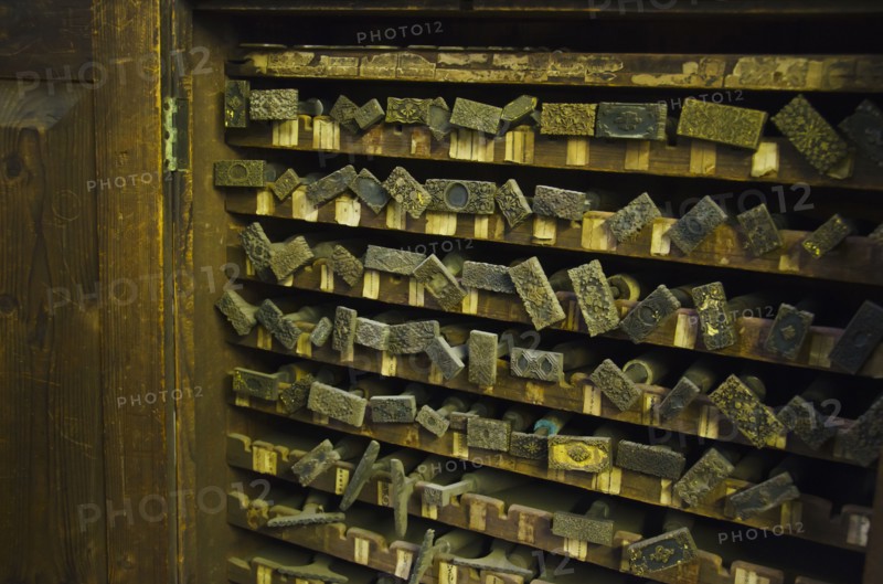 Close up of printing blocks from antique book binding.