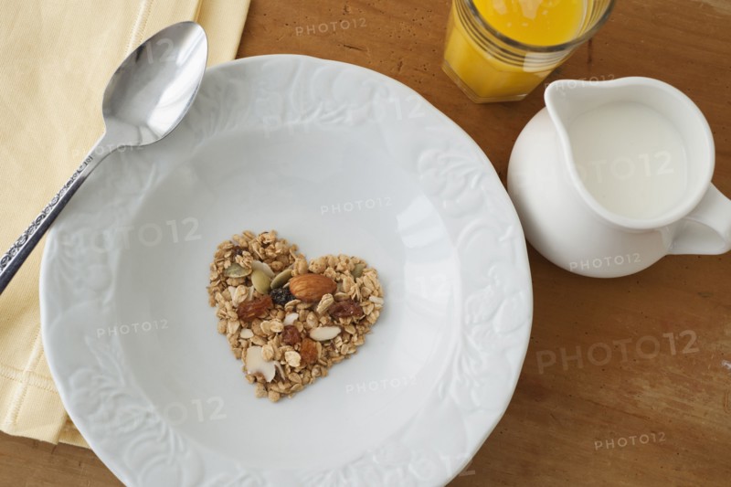 Heart shaped breakfast cereal in bowl.