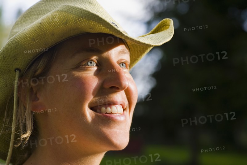 USA, Montana, Whitefish, Young woman wearing cowboy hat. Photo : Noah Clayton