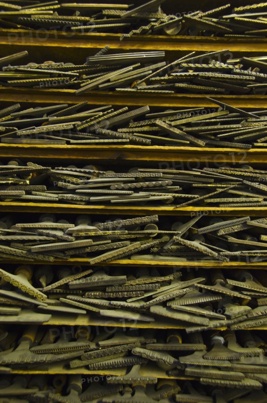 Close up of printing blocks from antique book binding.