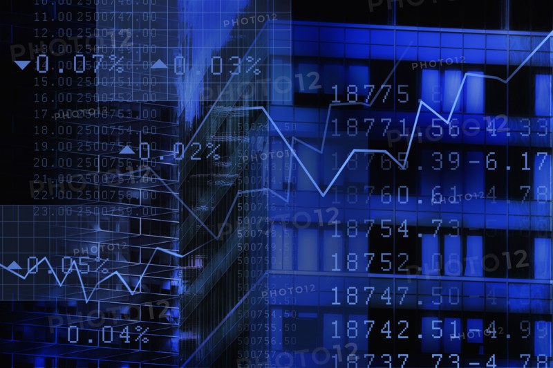 USA, New York, New York City, stock quotes reflecting on window.
