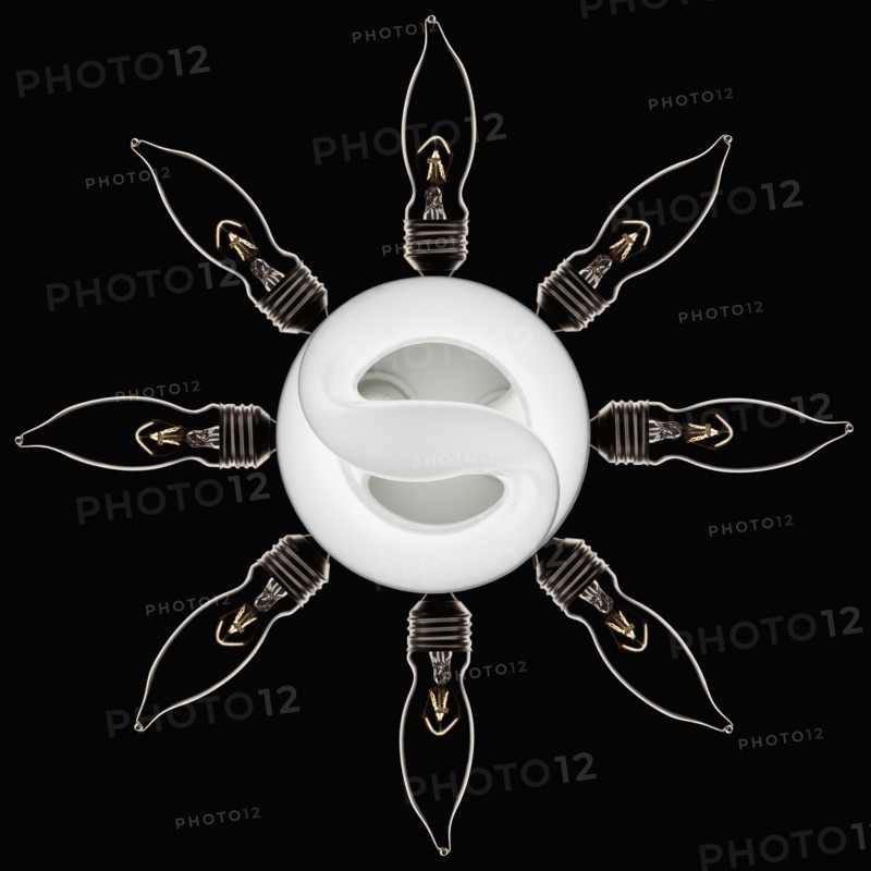 Energy efficient light bulbs in sun shape, studio shot. Photo : Mike Kemp