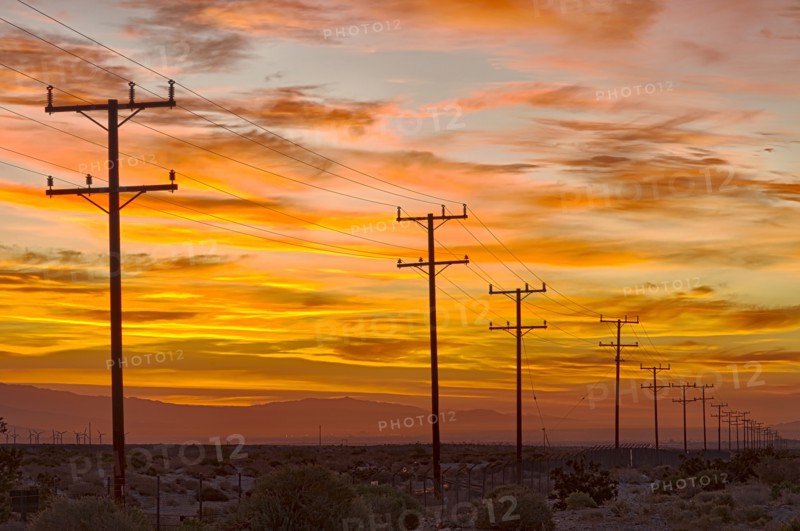 USA, California, Palm Springs, power line at sunrise. Photo : Gary Weathers
