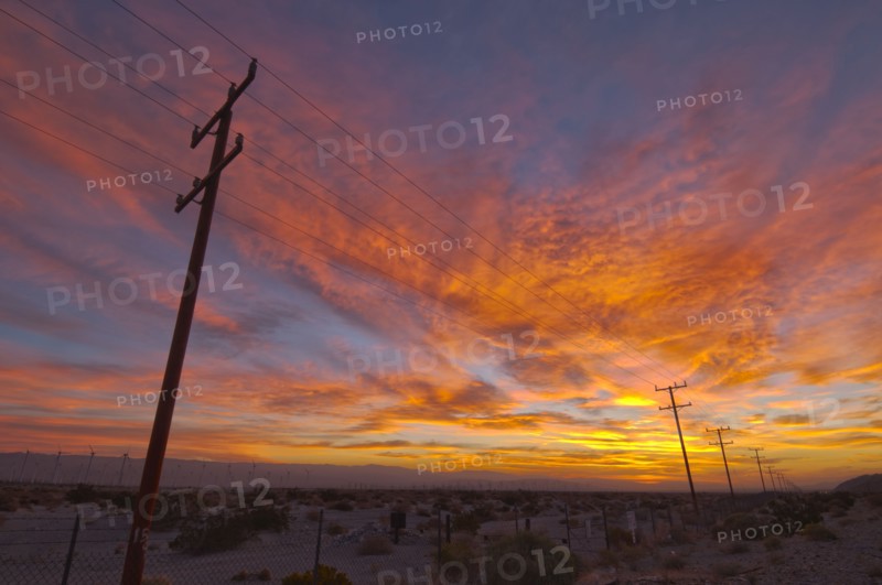 USA, California, Palm Springs, power line at sunrise. Photo : Gary Weathers