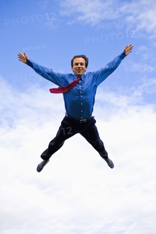 Businessman mid-air. Photo : Noah Clayton