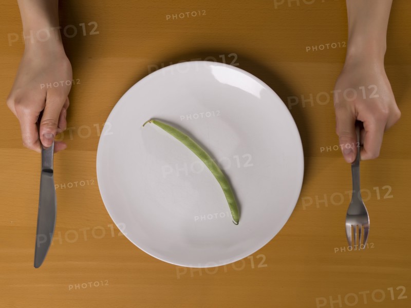 Single bean on white plate. Photo : Dan Bannister