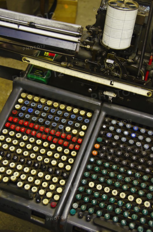 Close up of push buttons from printing press.
