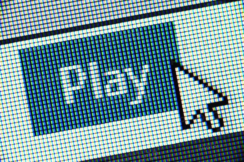 Close up of computer icon and cursor.