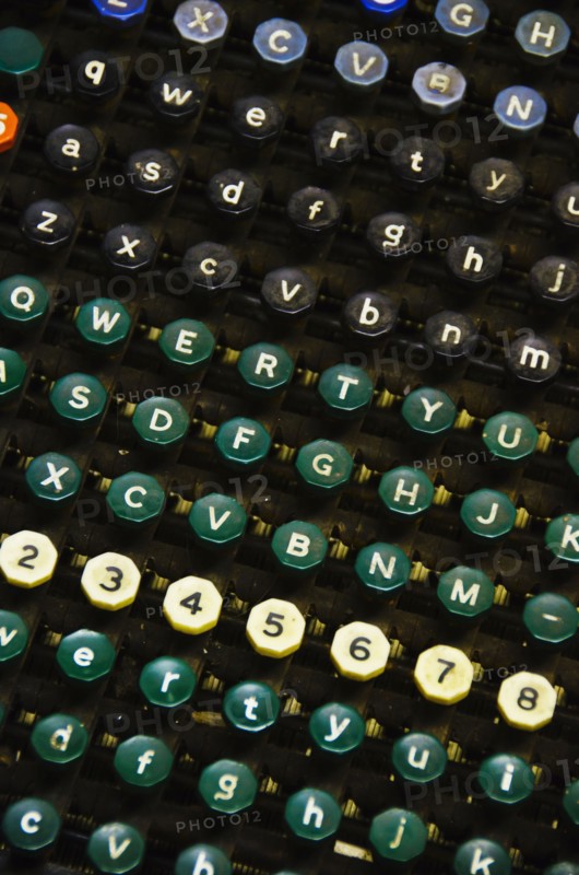 Close up of push buttons from printing press.