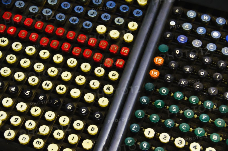 Close up of push buttons from printing press.