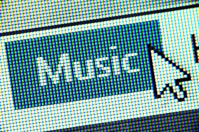 Close up of computer icon and cursor.