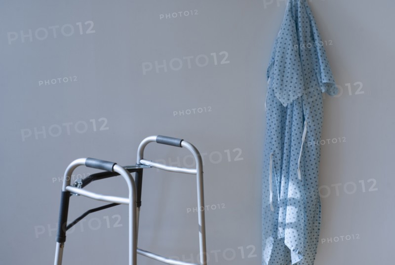 Walking frame and patients gown in hospital.