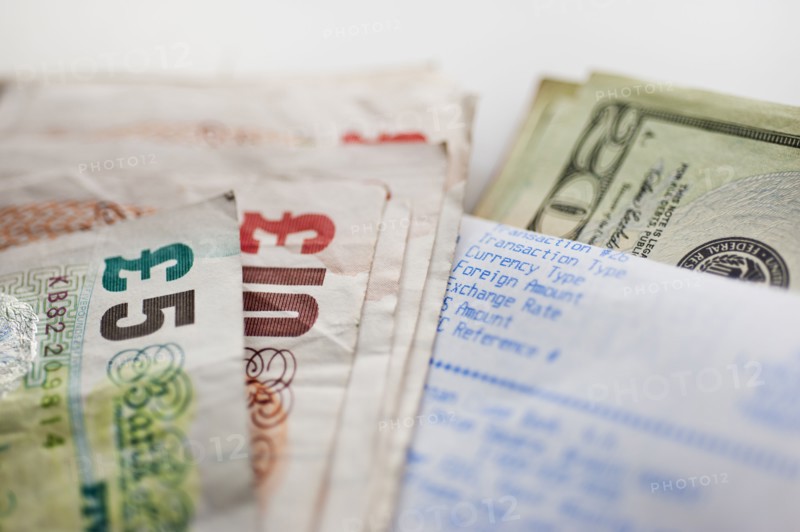 British and American paper currency, close-up.
