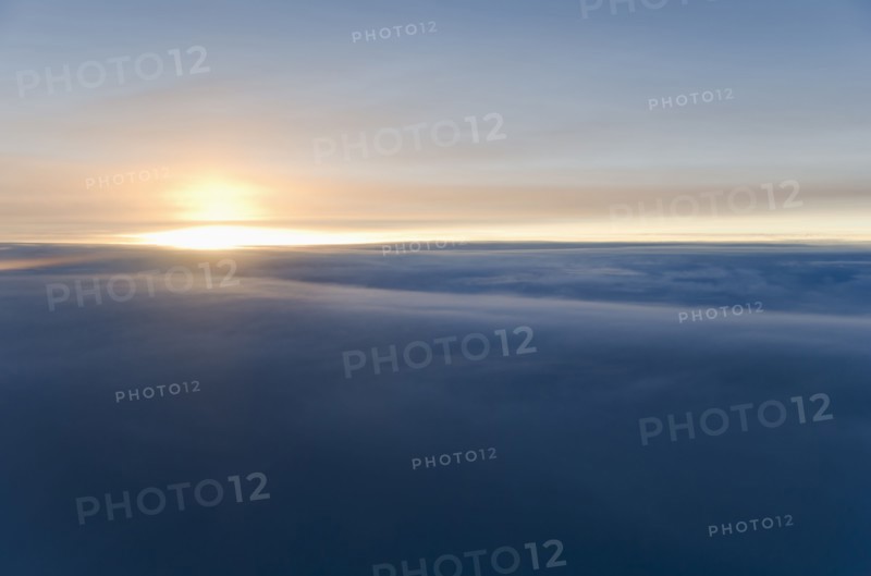 Sunrise over clouds.