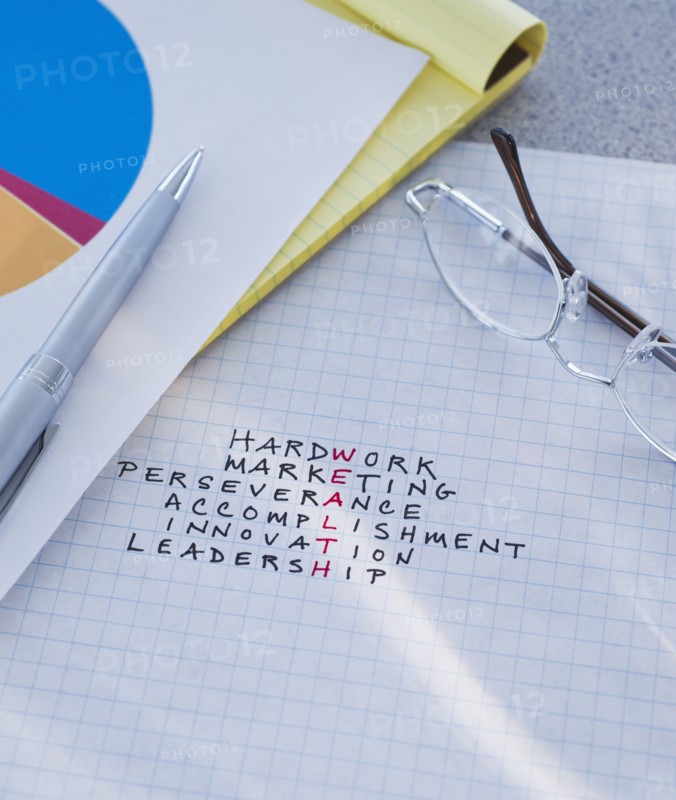 Crossword puzzle reading WEALTH. Photo : Daniel Grill