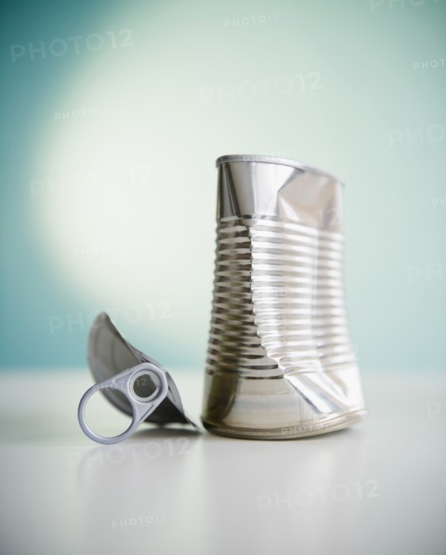 Damaged tin can. Photo: Jamie Grill Photography