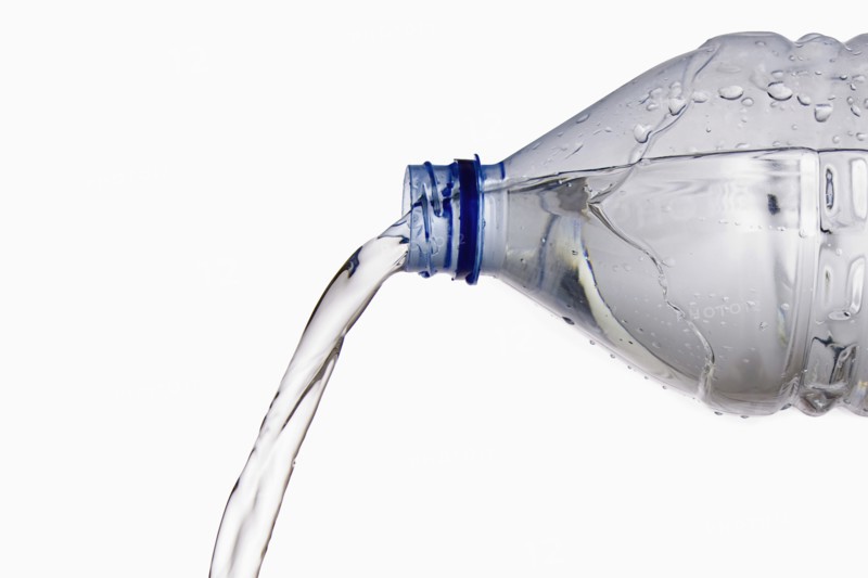 Pouring Cold Water from Bottle