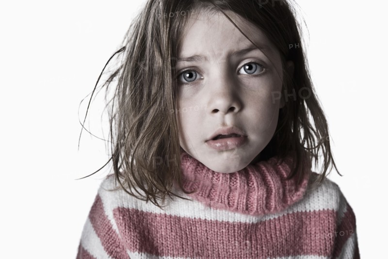 Powerful Shot of a Messy and Timid Child