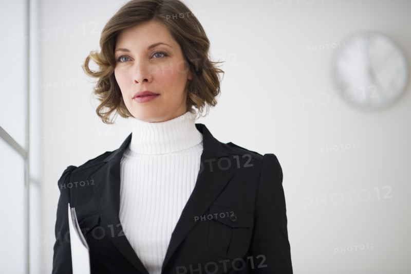 Portrait of businesswoman in office.
