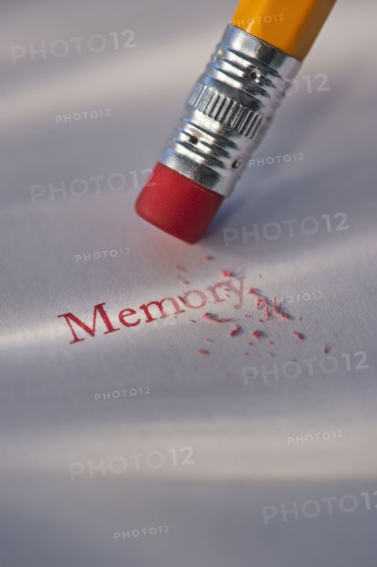 Studio shot of pencil erasing the word memory from piece of paper. Photo: Daniel Grill