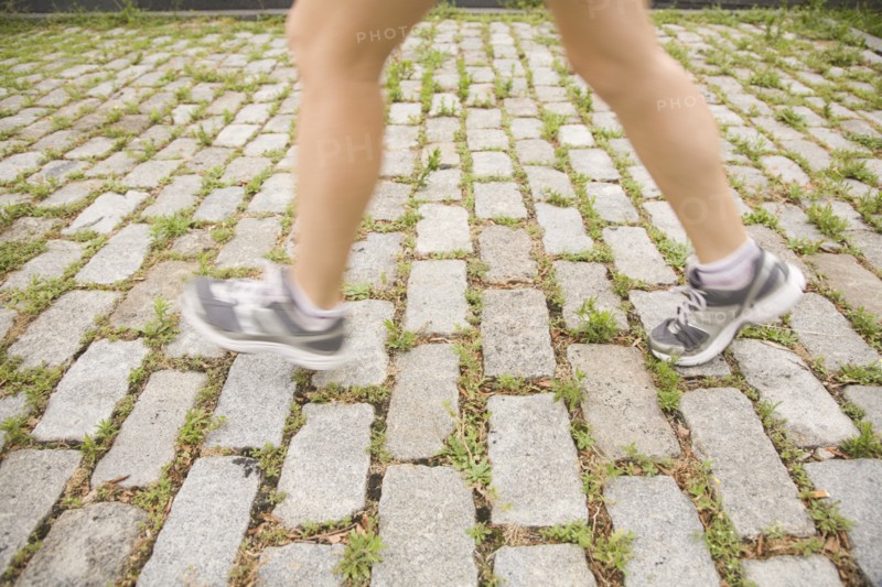 Blurred legs of woman jogging. Photo: Kristin Lee