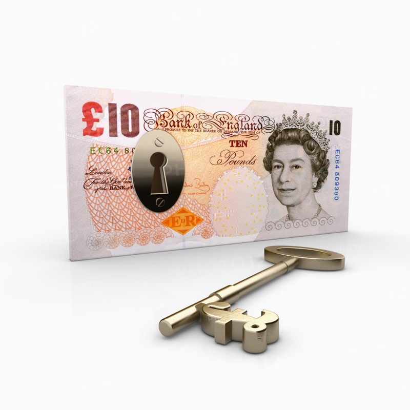 Ten Pond banknote with lock inside, key with Pound Sterling symbol laying beside. Photo: Jon Boyes