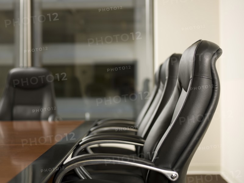 Paper and telephone in board room. Photo: Dan Bannister