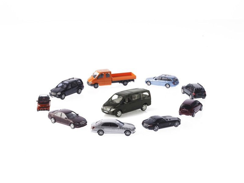 Circle of different cars on white background. Photo : David Arky