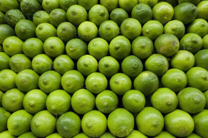 Stack of limes on market. Photo : Antonio M. Rosario