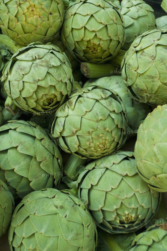 Stack of artichokes on market. Photo: Antonio M. Rosario