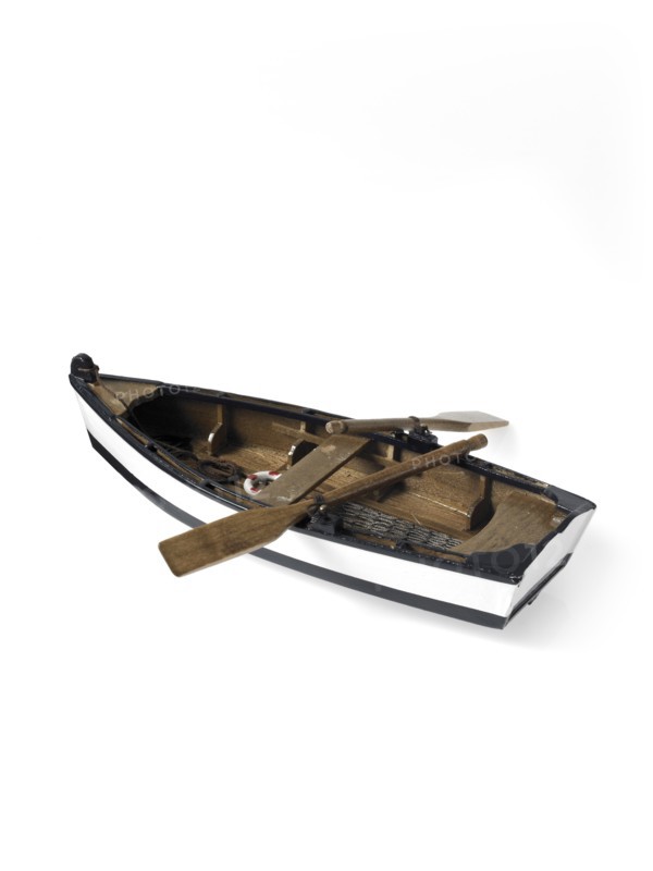 Studio shot of wooden boat. Photo : David Arky