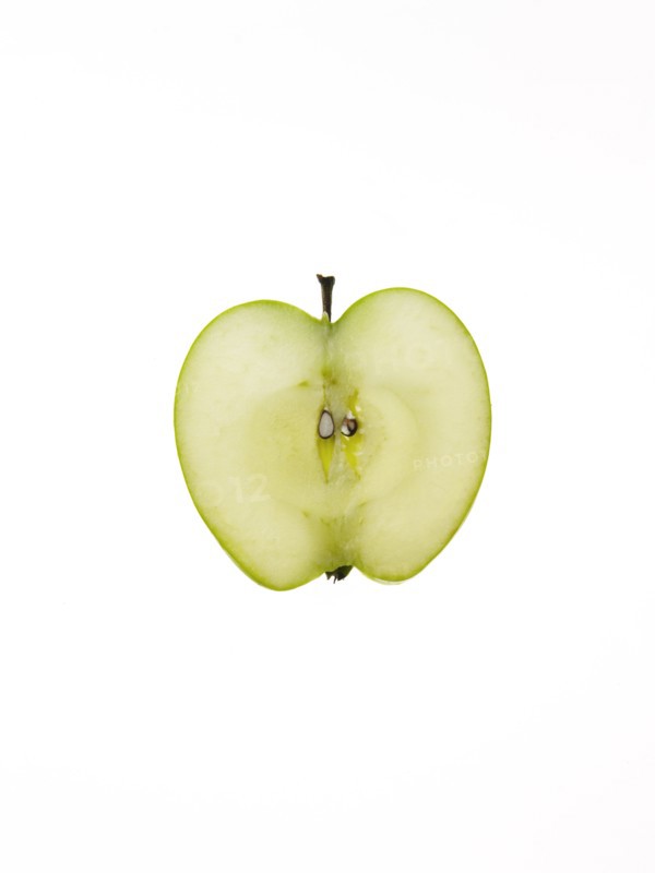 Apple slice on white background. Photo: David Arky