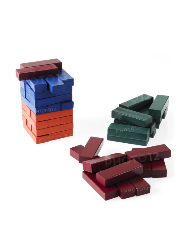 Studio shot of colorful wooden jenga blocks. Photo : David Arky