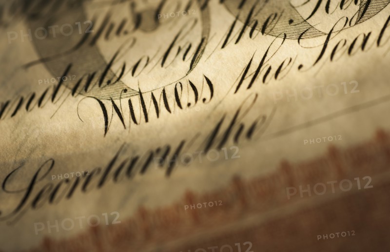 Close up of stock certificate.