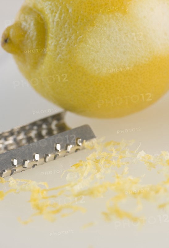 Close-up of lemon and grater. Photo : Jamie Grill Photography