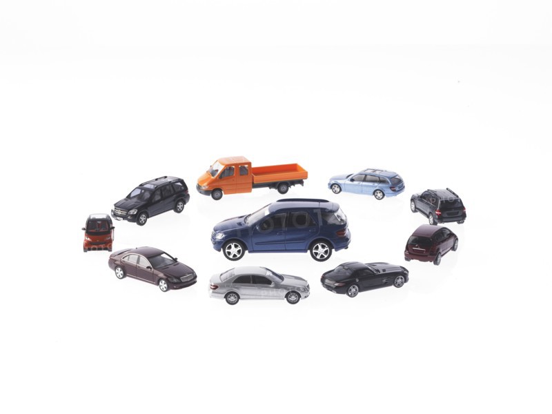 Circle of different cars on white background. Photo: David Arky