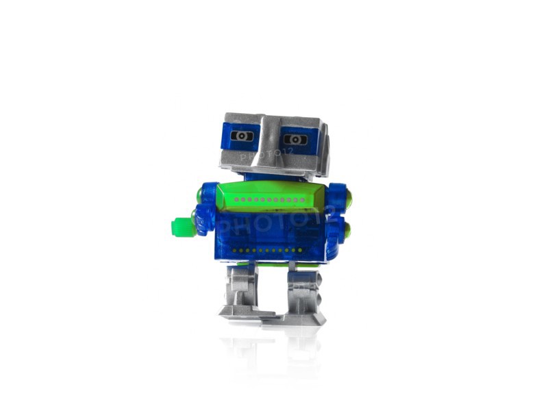 Toy robot on white background. Photo: David Arky