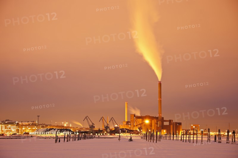 Finland, Helsinki, Smoking chimney in dock. Photo: Henryk Sadura