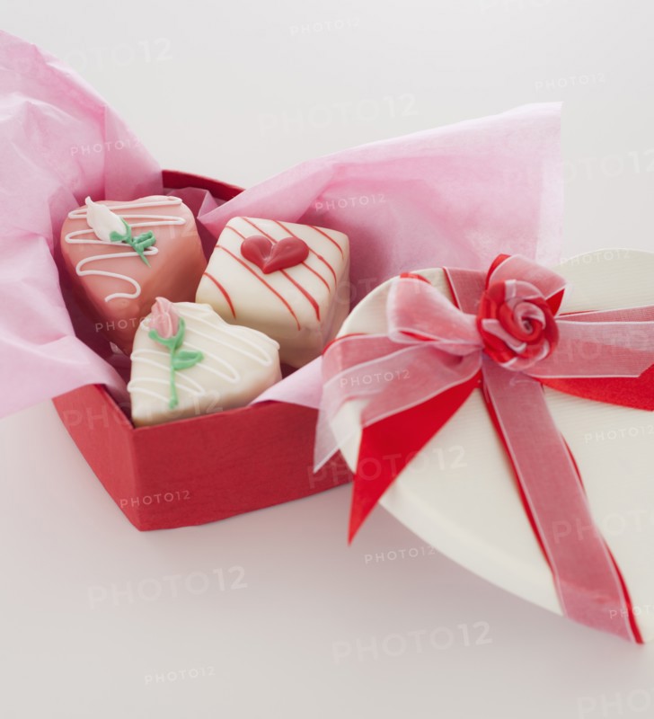 Studio shot of box of heart-shaped candies. Photo: Daniel Grill