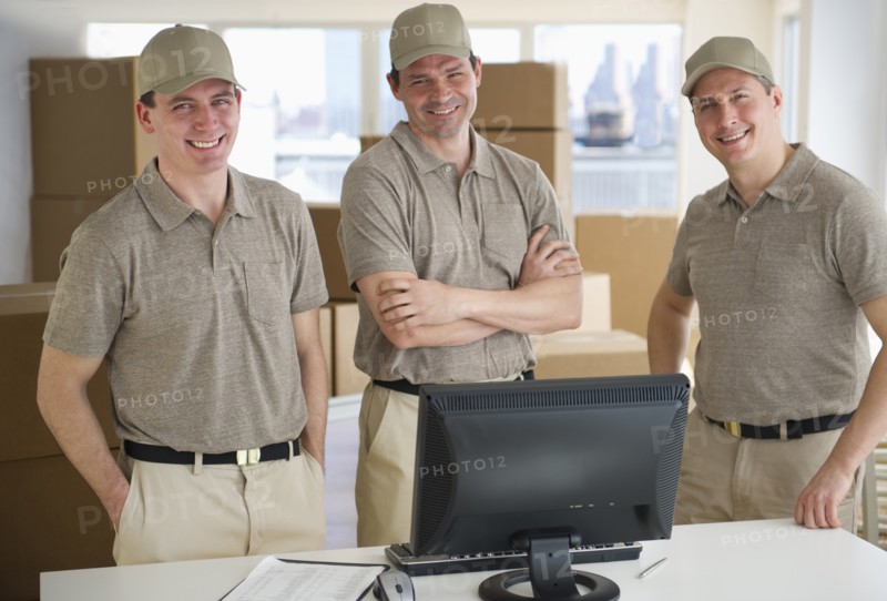 Three delivery warehouse workers.